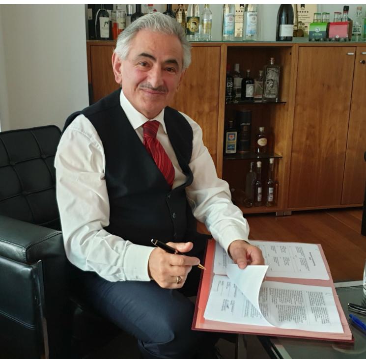 Musa Aksoy reviewing documents